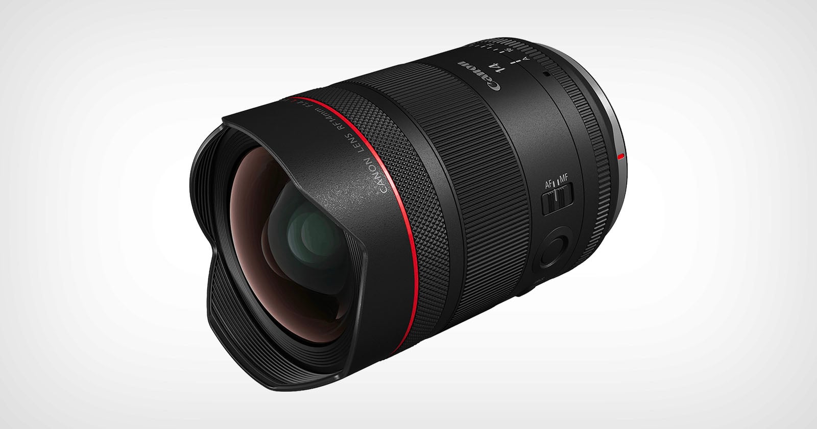 A black Canon RF 15-35mm f/2.8L IS USM camera lens with a red ring near the front, textured grip, and control switches, positioned on a white background.