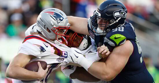 A group of football players in a game.