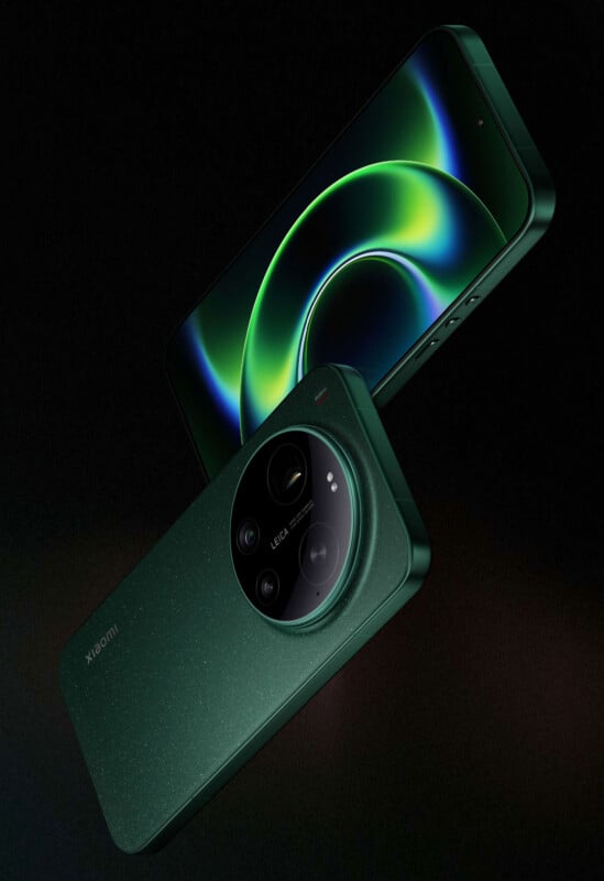 Two dark green smartphones are shown, one facing forward displaying a glowing green spiral on the screen, and the other facing backward highlighting a large circular camera module with "Leica" branding.