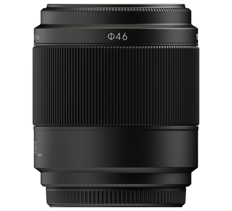 A black camera lens with a ribbed focus ring and a "Φ46" marking, indicating a 46mm filter thread. The lens is shown against a white background.