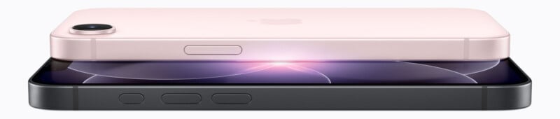 Two smartphones are shown stacked horizontally, one pink with the back and camera visible on top, and one black with the screen and side buttons visible underneath.