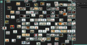 A computer screen displays a grid of numerous small, assorted images on a black background, resembling a digital photo gallery or image organization software interface.