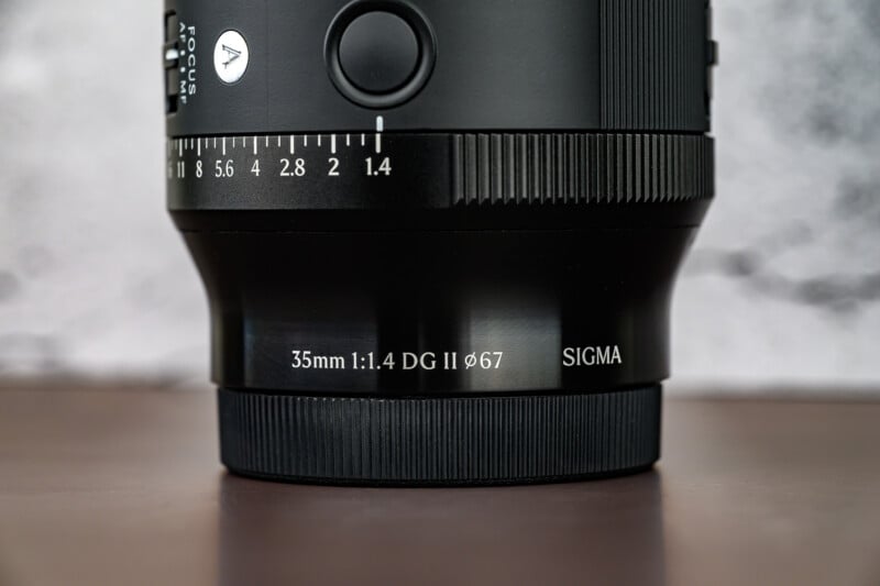 1.4 DG II ø67" on the lens barrel.