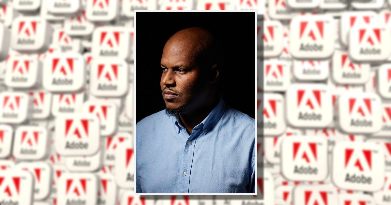 A man in a light blue button-down shirt looks to the side against a dark background. Behind him, there is a blurred collage of Adobe logos in red and white.