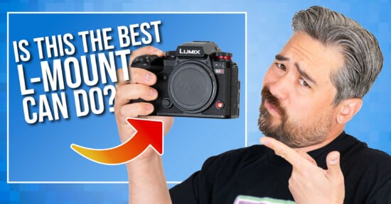 A man with gray hair and beard holds a Lumix S1 camera, pointing at it with a questioning expression. Text beside him reads, "Is this the best L-Mount can do?" with a red arrow pointing to the camera.