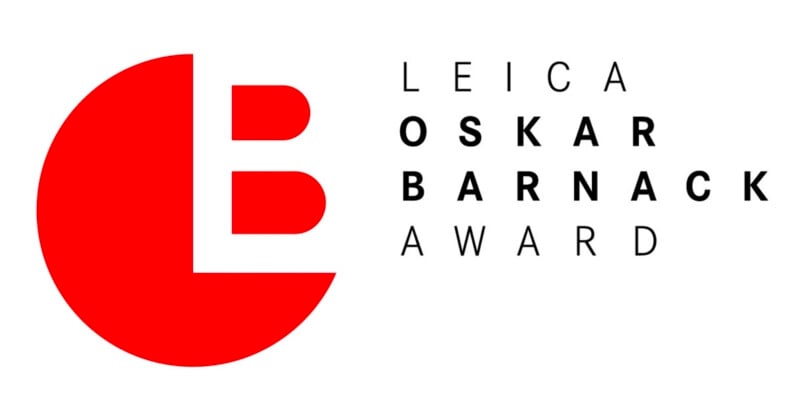 The logo for the Leica Oskar Barnack Award features a large red semi-circle with a white "L" and red "B" inside, alongside the text "LEICA OSKAR BARNACK AWARD" in black, all on a white background.