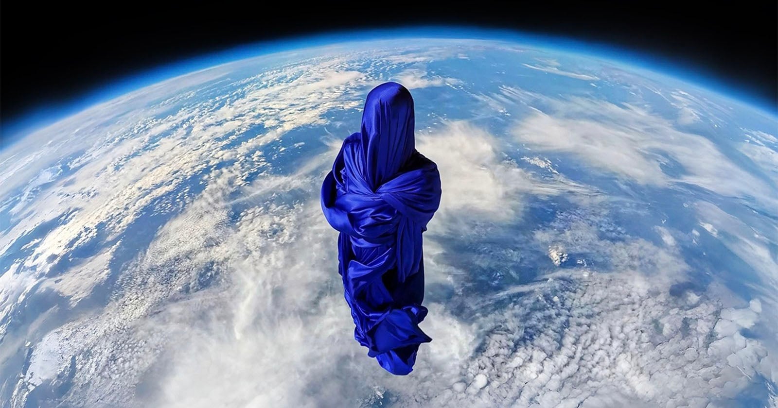 Ghostly Sculpture Floats Above Earth in Stunning Art Project