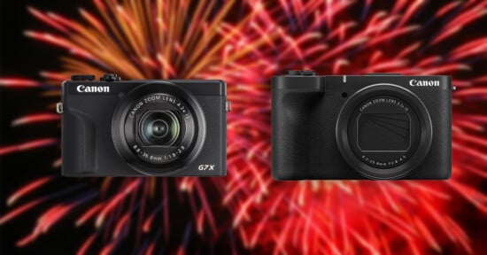 Two Canon digital cameras are displayed side by side against a vibrant background of colorful fireworks.