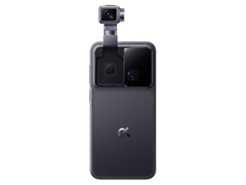 A smartphone with a large rear camera module and an additional external camera attachment mounted on top, featuring a lens that extends upward from the phone. The device has a modern, sleek design.