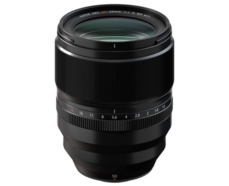 A black Fujinon XF 50mm f/1.0 camera lens is shown upright, featuring a textured focus ring and an aperture ring with markings ranging from f/1.0 to f/16.