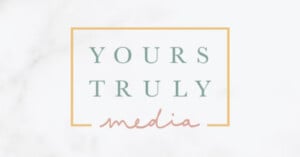 A logo with the text "YOURS TRULY" in green uppercase letters above the word "media" in pink script, all inside a yellow rectangular border on a light background.