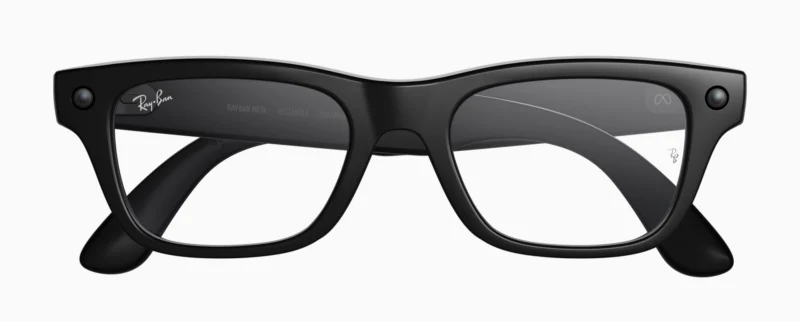 A pair of black Ray-Ban eyeglasses with thick rectangular frames, viewed from the front against a white background.