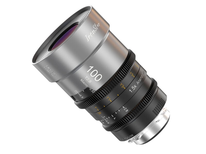 A close-up of a metallic camera lens labeled "IronStar 100 T2.0 Macro," showing various focus and aperture markings, with a sleek, modern design on a white background.