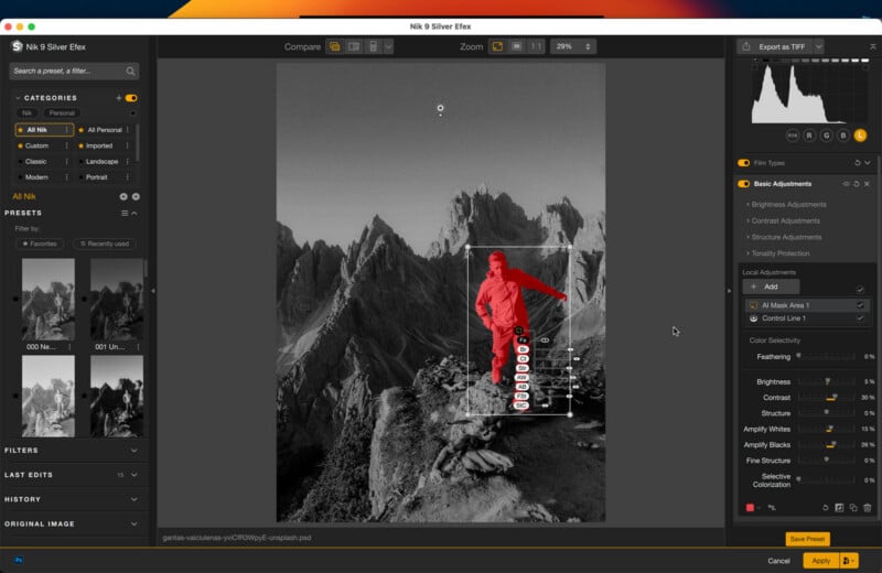 Photo editing software interface shows a black-and-white mountain scene with a person in a red jacket standing on rocks. Various editing tools, sliders, and adjustment panels appear around the main image.
