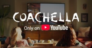 Two people sit on a couch watching a TV screen in a cozy living room. Large text on the image says, "Coachella Only on YouTube," with the YouTube logo displayed.