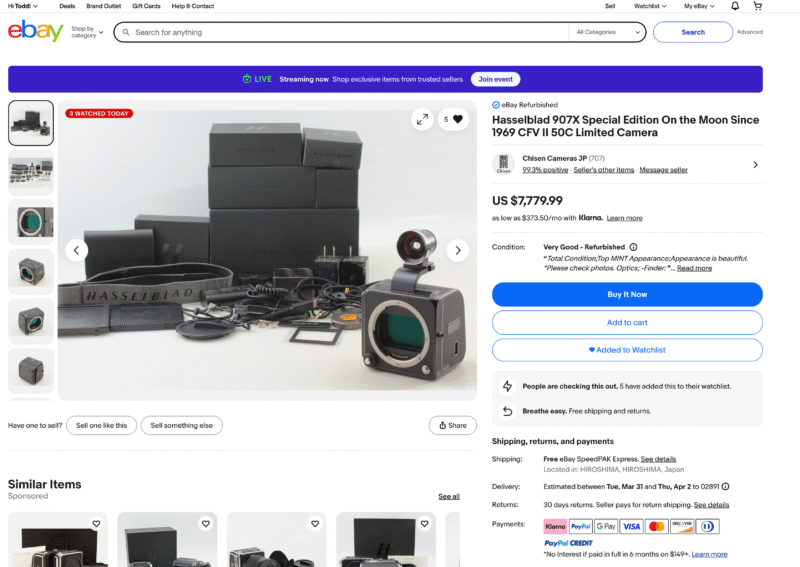 Screenshot of an eBay listing for a Hasselblad 907X Special Edition camera set, showing camera body, lens, accessories, packaging, and price of $7,779.99 USD. Listing details and similar items appear on the page.