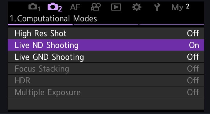 Camera settings menu displaying "Computational Modes." "Live ND Shooting" is highlighted in purple and set to "On," while other options like "High Res Shot," "Focus Stacking," and "HDR" are set to "Off.