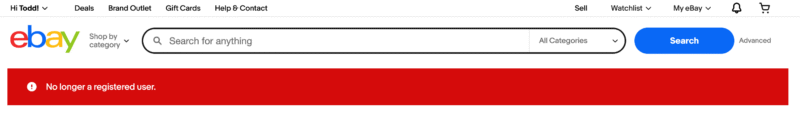 EBay homepage with search bar and a red banner that says "No longer a registered user.