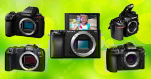 Five different digital cameras are displayed against a bright green background. The center camera’s screen shows a young girl smiling, while the other cameras surround it, facing various angles.