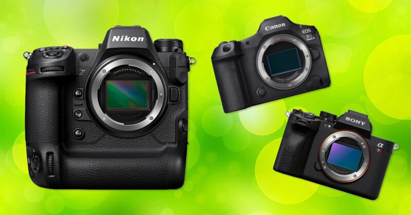 Three mirrorless camera bodies from Nikon, Canon, and Sony displayed on a vibrant green background with light bokeh effects. Each camera shows its exposed sensor, angled differently.