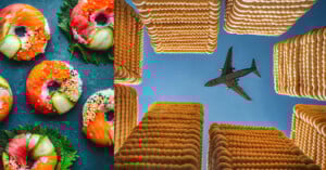 On the left, colorful sushi donuts with various toppings are arranged on a dark surface. On the right, a plane flies overhead, framed by tall, yellow buildings that resemble stacks of round cookies, against a bright blue sky.