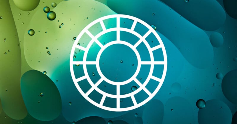 A white circular grid icon with evenly spaced segments is centered on a blue-green abstract background featuring bubbles and organic shapes.