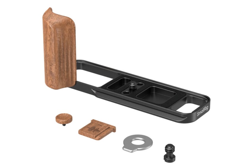 A black metal camera bracket with a wooden side handle is shown disassembled, along with four separate parts: a screw, a wooden plate, a metal washer, and a small black connector.