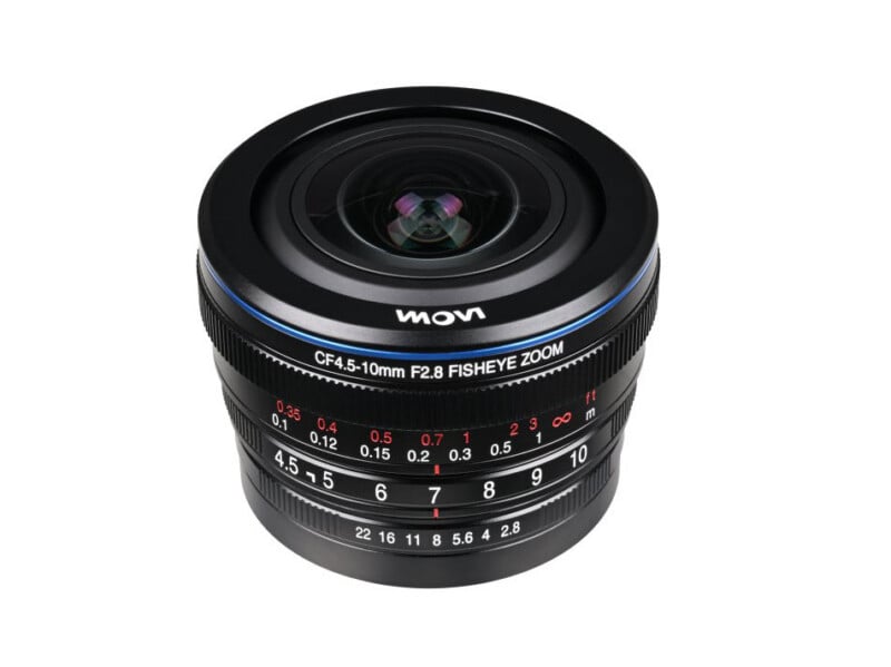 A Laowa CF 4.5-10mm F2.8 fisheye zoom camera lens, shown from an angled view, featuring detailed focus and aperture markings on the lens barrel.
