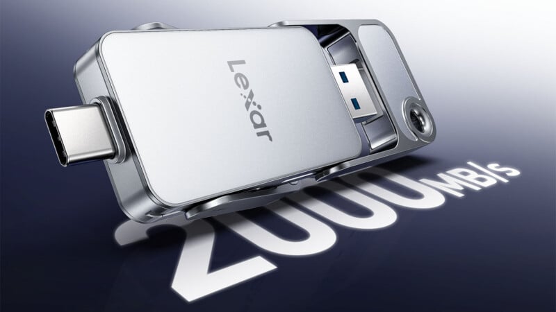 A silver Lexar USB flash drive with both USB-C and USB-A connectors is displayed, casting a shadow over large text reading “2000 MB/s” to highlight its high data transfer speed.