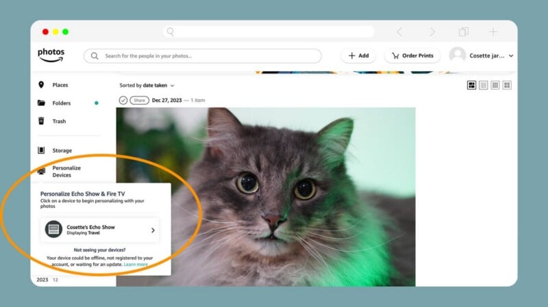 A computer screen displays a photo management app showing a fluffy gray cat. A highlighted section on the left prompts the user to personalize their Echo Show or Fire TV with their photos.