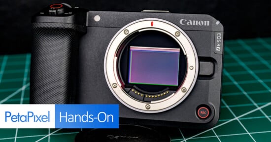 A Canon EOS R camera body without a lens is displayed on a green cutting mat, showing the sensor. "PetaPixel Hands-On" is overlaid in the lower left corner.