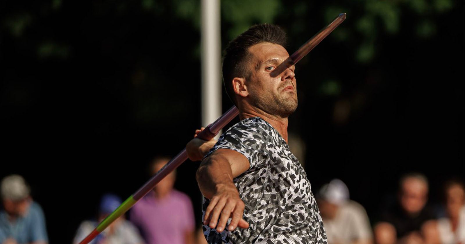This Javelin Thrower Looks Like He is Impaling Himself in Crazy Optical Illusion Photo