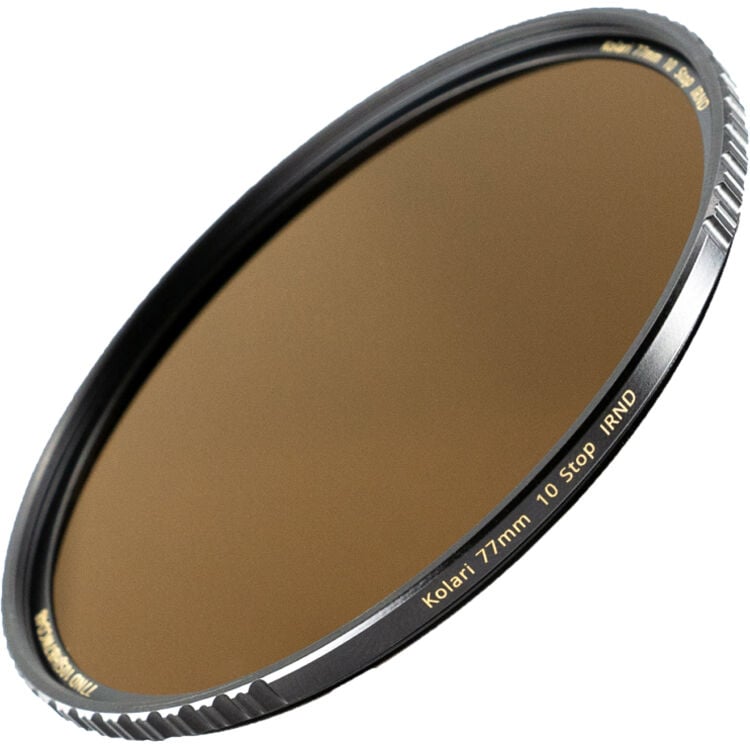 A Kolari 77mm 10 Stop IRND camera lens filter with a metallic rim and brown-tinted glass, designed for reducing light intake during photography.