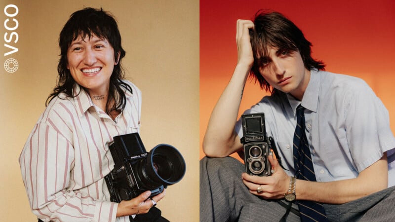 Two people holding vintage cameras are shown side by side; the left person is smiling, wearing a striped shirt, while the right person has a serious expression, wearing a shirt and tie. The VSCO logo is on the left.