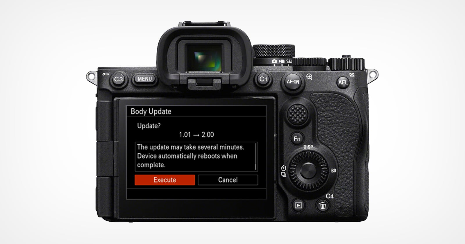 The back of a digital camera displays its screen showing a firmware update prompt, with options to "Execute" or "Cancel" and a message about the update process and automatic reboot.