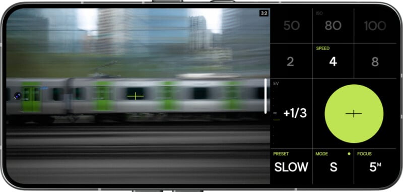A smartphone screen displays a blurred photo of a moving urban train with green doors. Camera settings, including speed, ISO, exposure, and focus, are shown on the right side of the screen.
