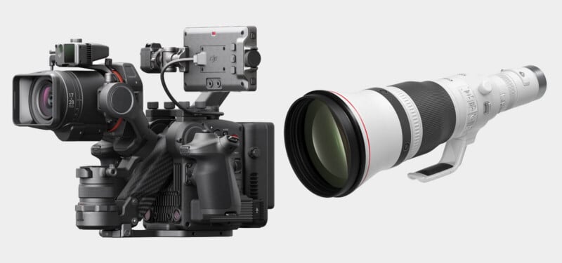 A professional digital video camera with multiple accessories is shown next to a large, white telephoto camera lens with a tripod collar, both on a plain light gray background.