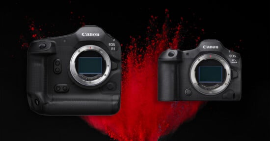 Two Canon EOS cameras without lenses are shown side by side against a black background with a burst of red powder behind them. The left camera is larger, labeled EOS R1, and the right camera is labeled EOS R5 Mark II.
