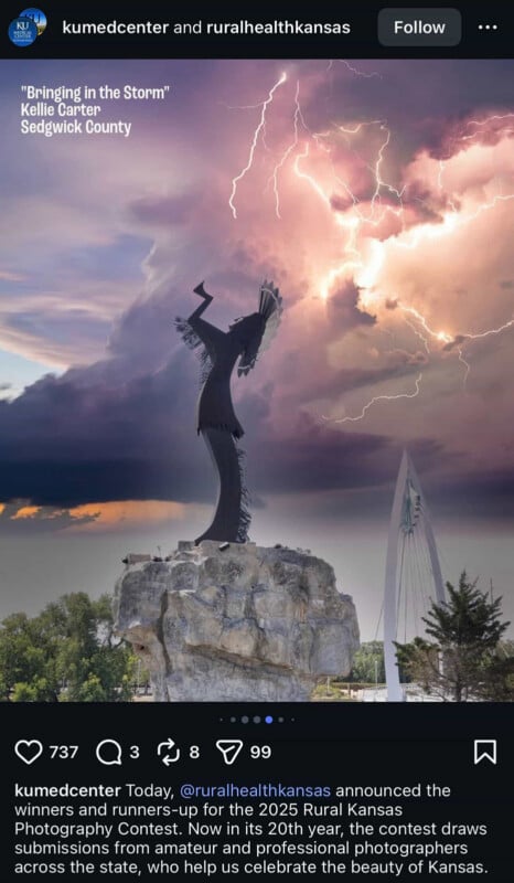A dramatic photo of the Keeper of the Plains statue in Kansas, illuminated by lightning in a dark, cloudy sky. The statue stands on a rocky pedestal, with a bridge and trees visible in the background.