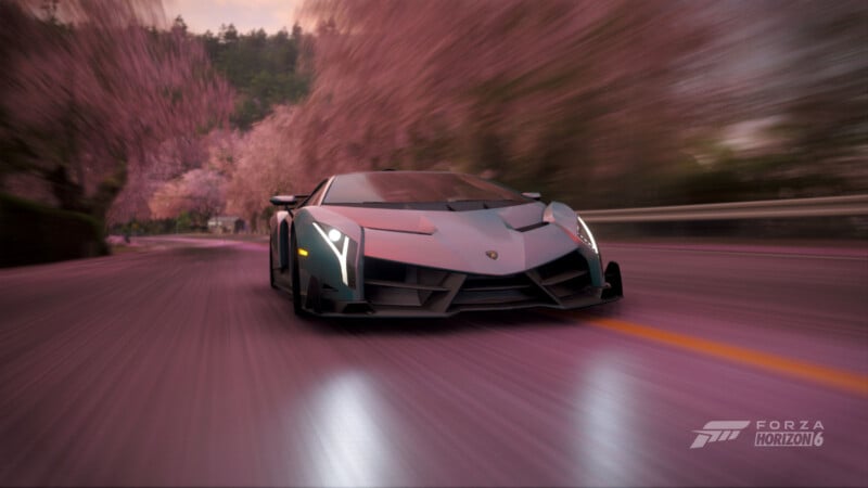 A sleek Lamborghini speeds down a blurred, pink-toned road lined with blossoming trees in Forza Horizon 5; the motion creates a dynamic, high-energy feel. Forza Horizon 5 logo is visible in the bottom right corner.