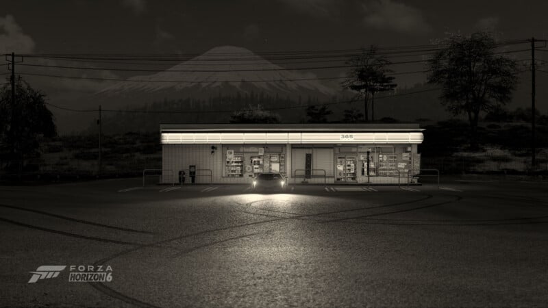 A car with headlights on is parked in front of a lit convenience store at night, with Mount Fuji visible in the background. Tire skid marks are on the wet parking lot. The scene is in grayscale. Forza Horizon 5 logo is in the corner.