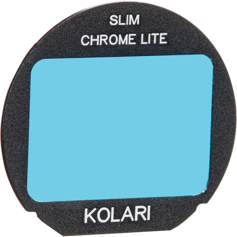 A circular camera filter labeled "SLIM CHROME LITE KOLARI" with a blue-tinted rectangular glass center and a black frame.
