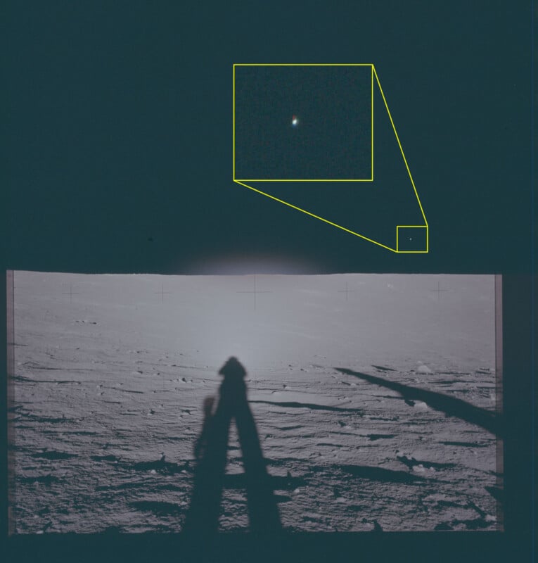 A photo of the lunar surface with long shadows in the foreground. A small bright dot in the sky is magnified in an inset, showing a close-up view of the Earth as seen from the Moon.