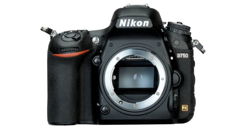 Front view of a Nikon D750 DSLR camera body without a lens, showing the lens mount and camera controls.