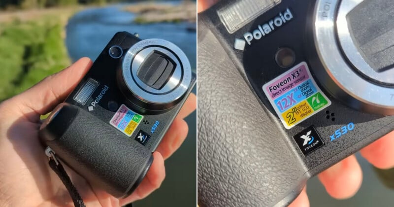 A person holds a black Polaroid digital camera outdoors near water; close-up shows details like "Foveon X3," "12X optical zoom," and various colorful labels on the camera's front grip.