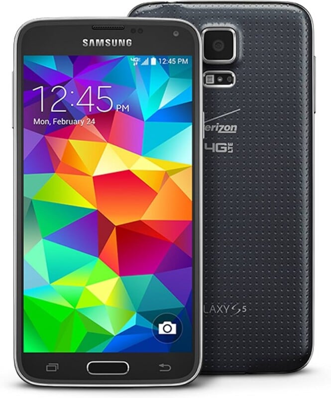 A black Samsung Galaxy S5 smartphone showing its colorful home screen, with another view displaying the textured back cover, camera, and Verizon 4G LTE branding.
