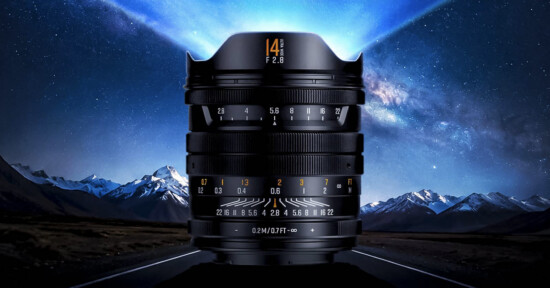 A wide-angle camera lens stands upright on a road, with snow-capped mountains and a starry night sky in the background, creating a dramatic and futuristic effect.