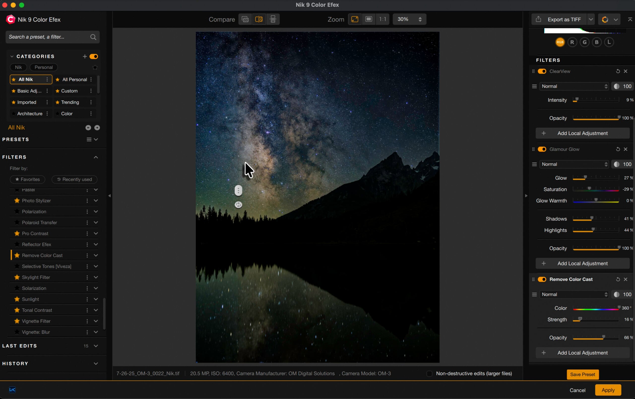A photo editing software interface displays an image of a star-filled night sky with the Milky Way above mountains and a lake, with editing adjustment panels visible on both sides of the screen.