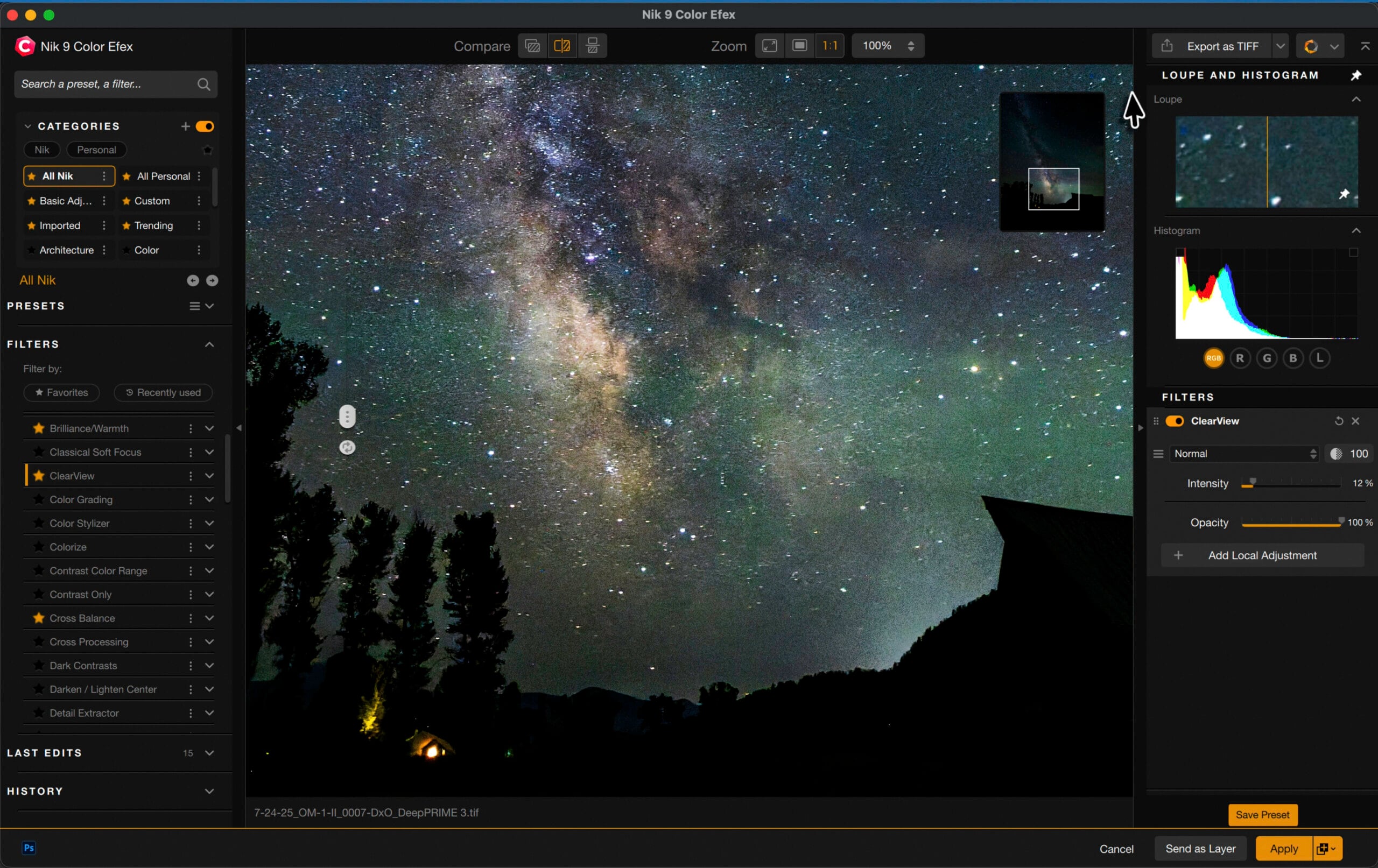 A computer screen shows photo editing software open with an image of the Milky Way galaxy in the night sky above silhouetted trees and a building. Editing tools, filters, and a histogram are visible on the interface.