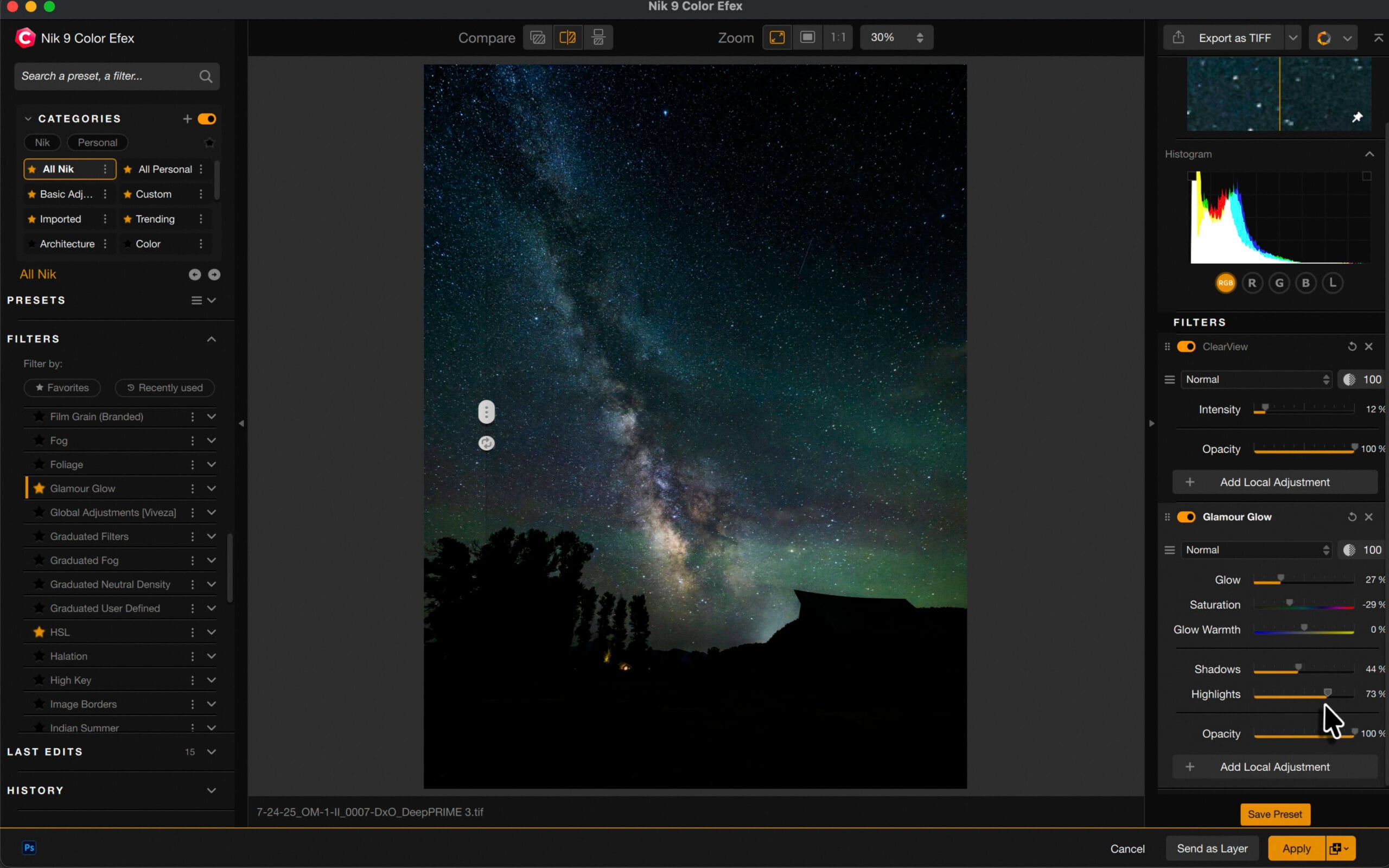 A screenshot of a photo editing software displaying an image of the Milky Way galaxy in the night sky above silhouetted trees and buildings, with editing tools and adjustment sliders visible on the right side.